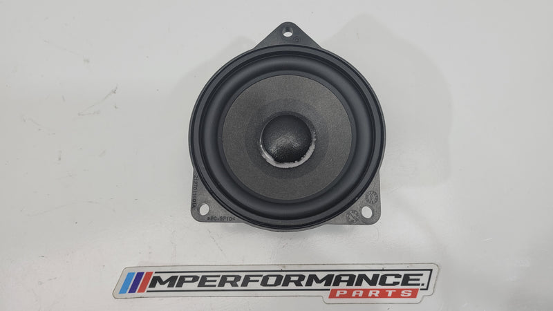 BMW G80 M3 Harman Kardon speaker with visible branding and detailed speaker grille, designed for high-quality audio in the vehicle.