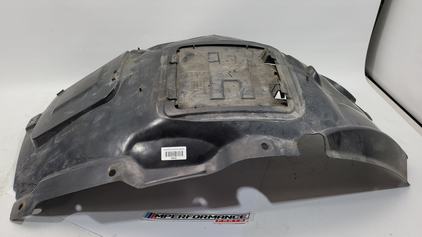 BMW 3 Series F30 F31 MSport front left wheel arch liner cover, passenger side, in black plastic with mounting points.