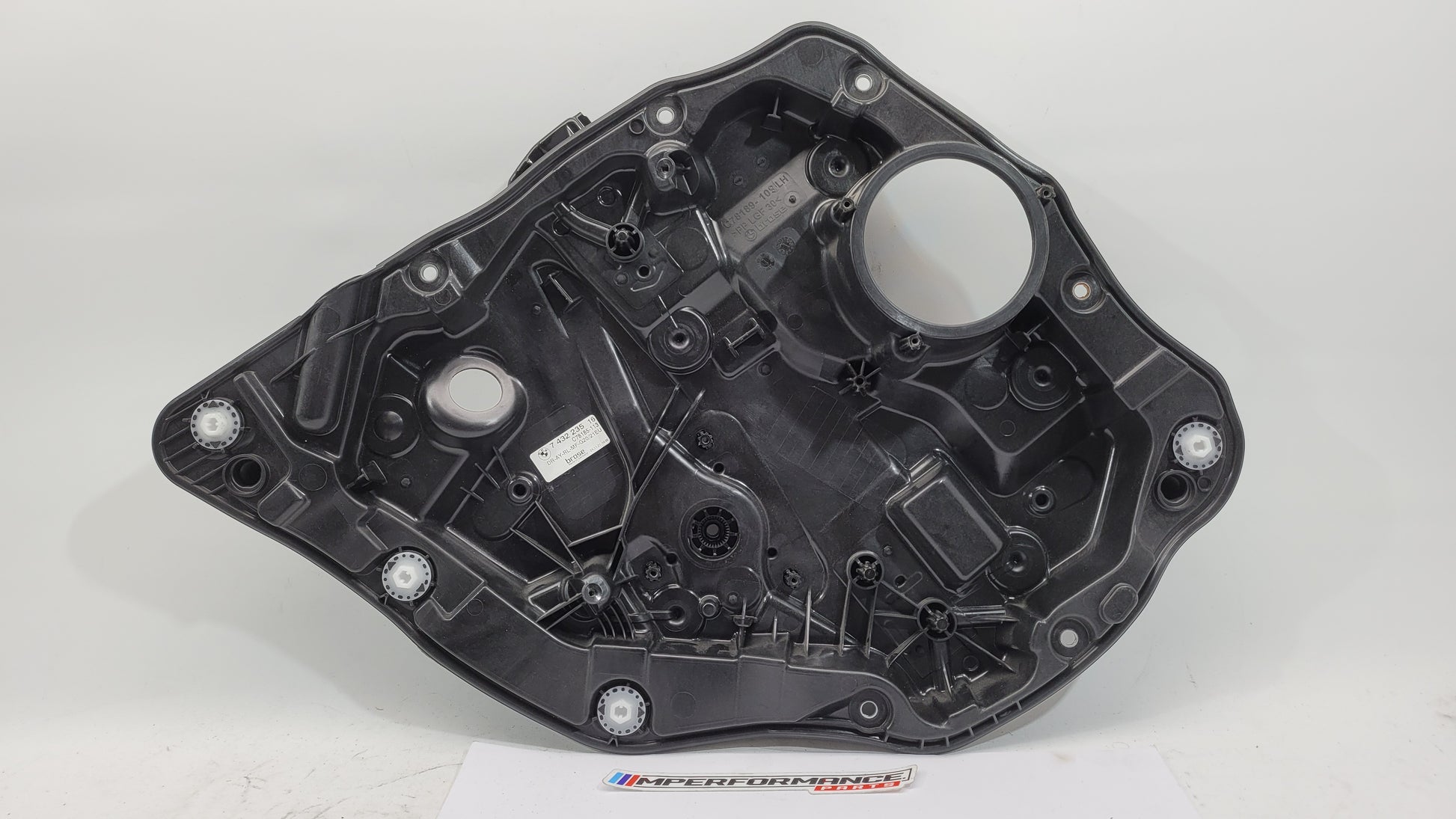 BMW M3 Series G20/G8x rear left window regulator and motor by MPerformance.parts, showing the black metal and plastic component.