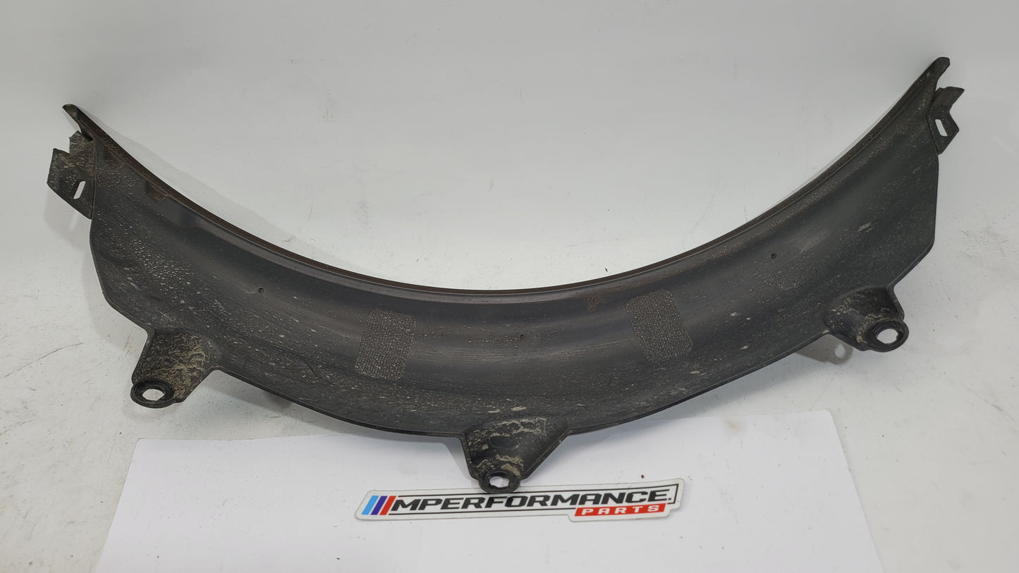 BMW M3 G80 G81 rear side wheel arch trim flaring in black, showing the textured exterior detail on the wheel arch area.