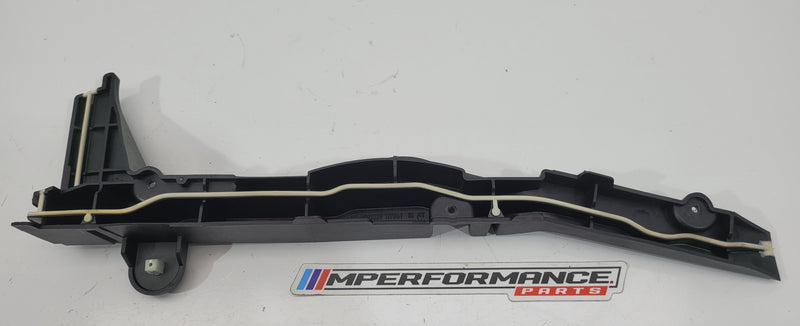 BMW M3 G80 front left trim panel cover, part number 6991229, from MPerformance.parts, showing the sleek, molded interior trim component.