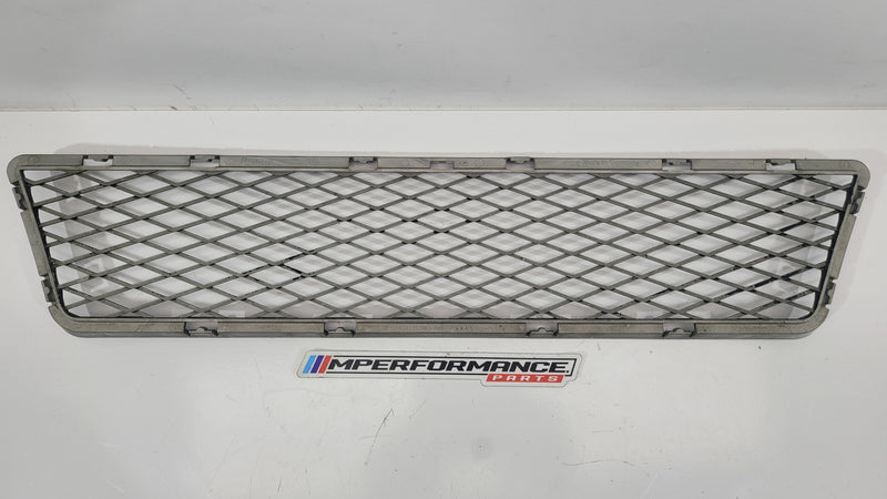 E92 BMW front bumper lower center grille by MPerformance.parts, showing close-up of automotive grille with mesh design.