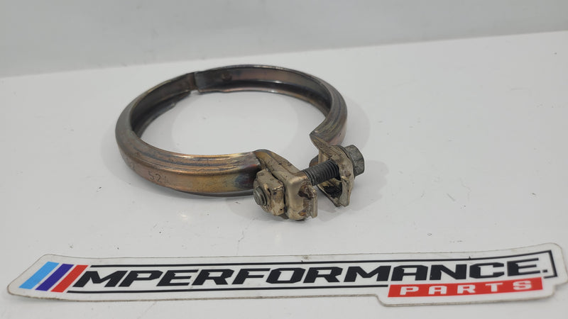 BMW M4 F82 exhaust pipe clamp by MPerformance.parts, showing the metal clamp with bolt and gasket for secure exhaust connection.