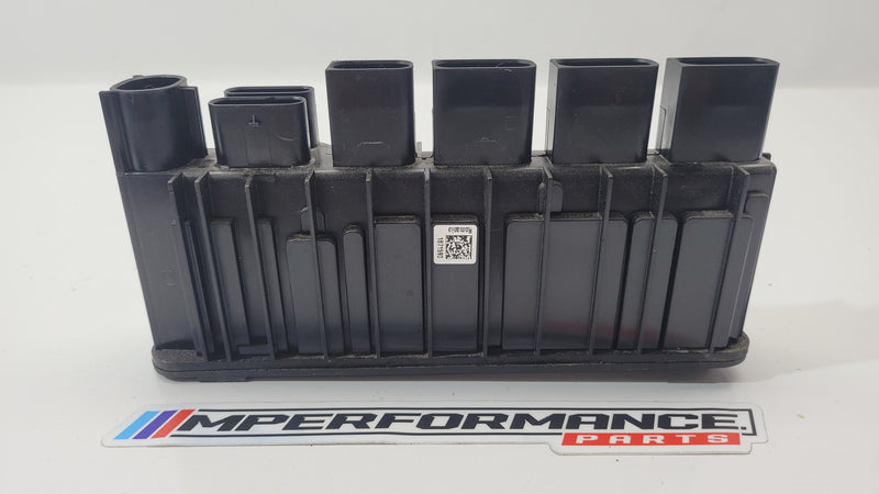 BMW M3 G80 integrated power supply control module by MPerformance.parts, showing the compact electronic control device with connectors.