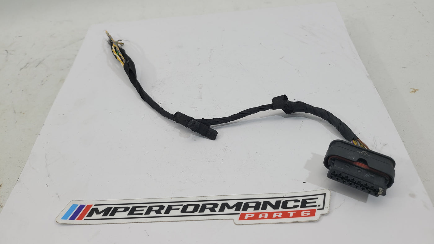 BMW parking sensor socket housing by MPerformance.parts, showing close-up of the connector and mounting details.