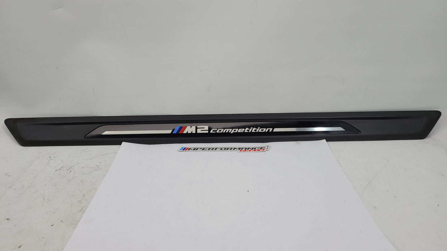 BMW M2 Competition F87 door sill scuff plate, left or right, with MPerformance.parts branding, shown in close-up view.