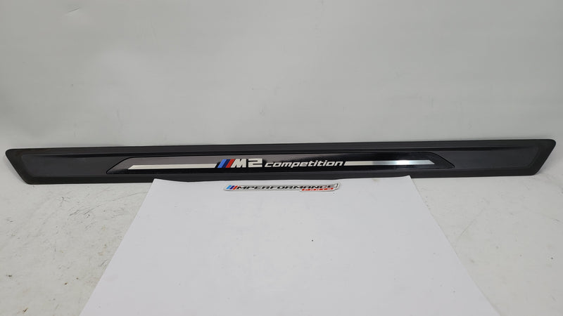 BMW M2 Competition F87 door sill scuff plate, left or right, with MPerformance.parts branding, shown in close-up view.