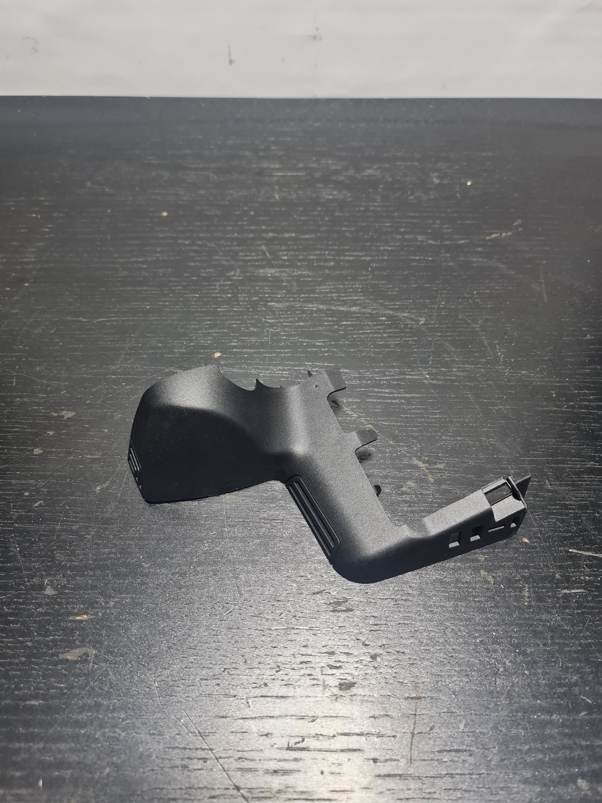BMW M3 G80 interior front ceiling cover cap in black, showing close-up of the car's interior ceiling component.