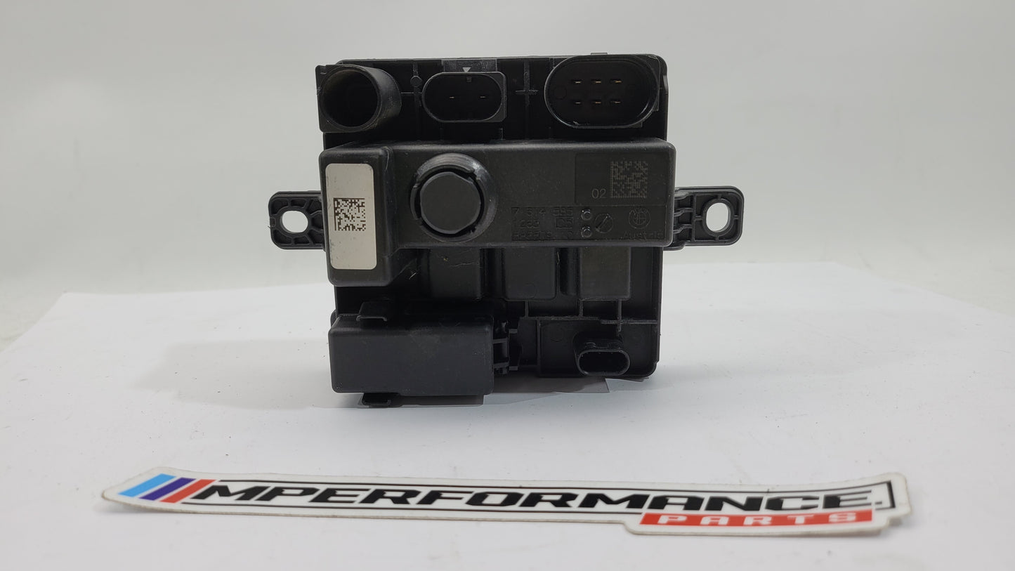 BMW F Series F8x M3 M4 integrated supply module by MPerformance.parts, showing the detailed black component with wiring and connectors.
