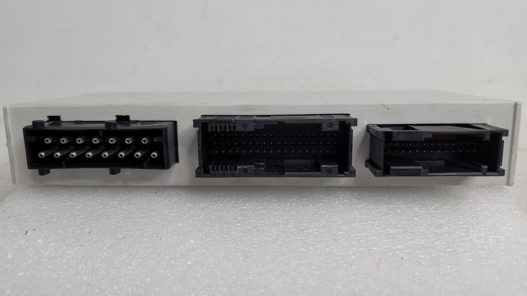 BMW 3-Series E46 Body Control Module GM5 by MPerformance.parts, showing the electronic control unit with connectors and circuit board.
