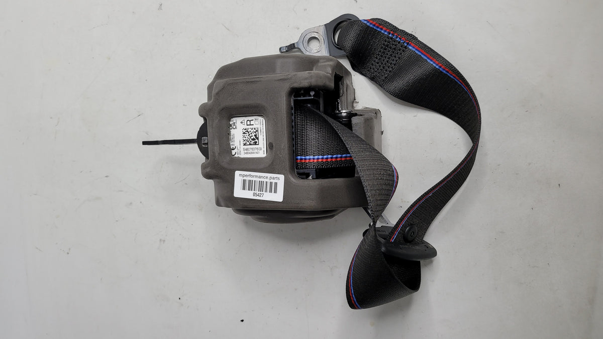 BMW MPerformance.parts engine cover part with black finish, showcasing detailed branding and sleek design.