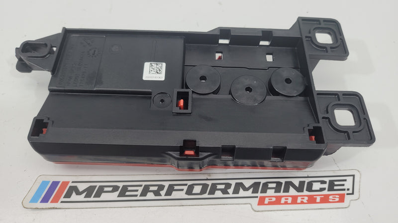 BMW G20 G80 M3 battery terminal power distribution fuse box, showing the fuse connections and electrical components.