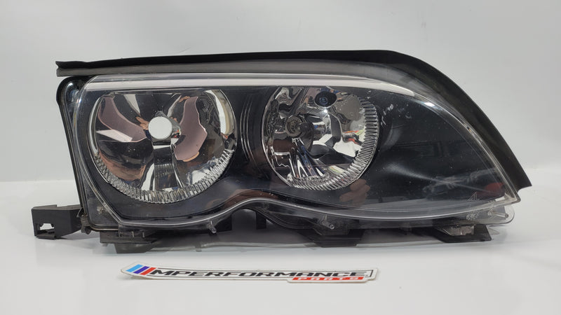 BMW E46 3 Series right side headlight with clear lens and black housing, designed for optimal visibility and style.