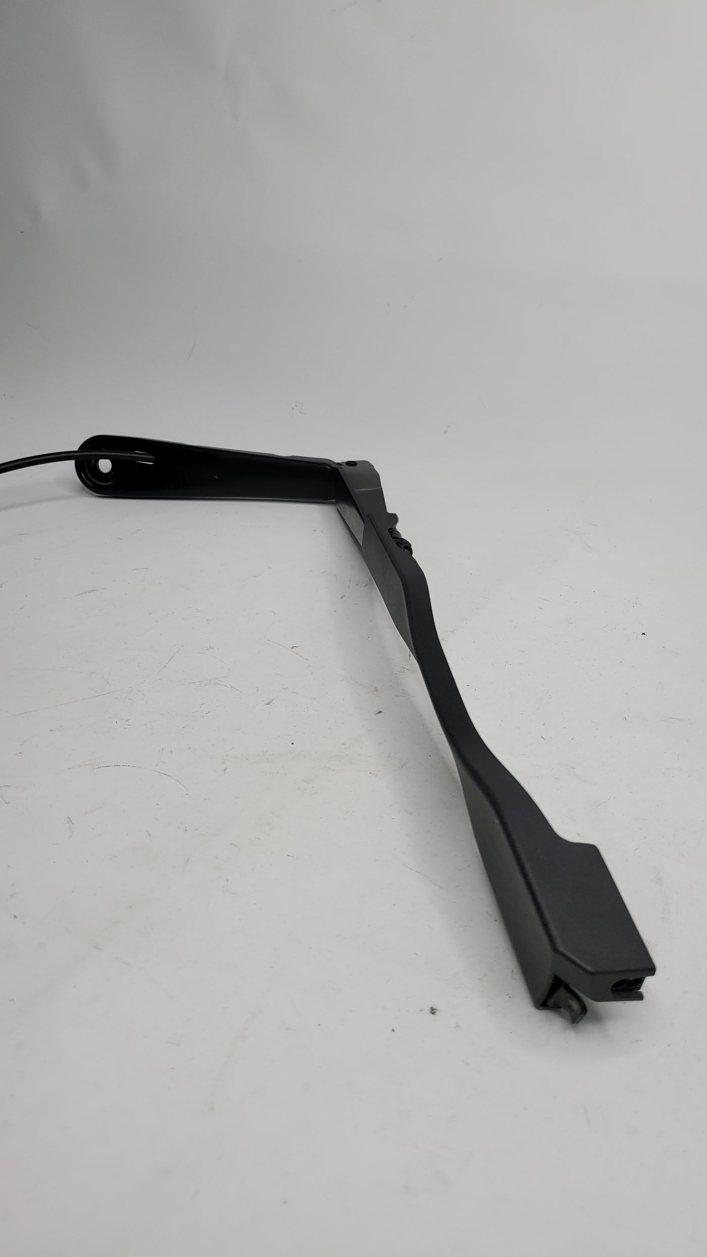 BMW G80 driver side right wiper arm for windshield, MPerformance.parts, showing the black metal wiper arm with mounting hardware.