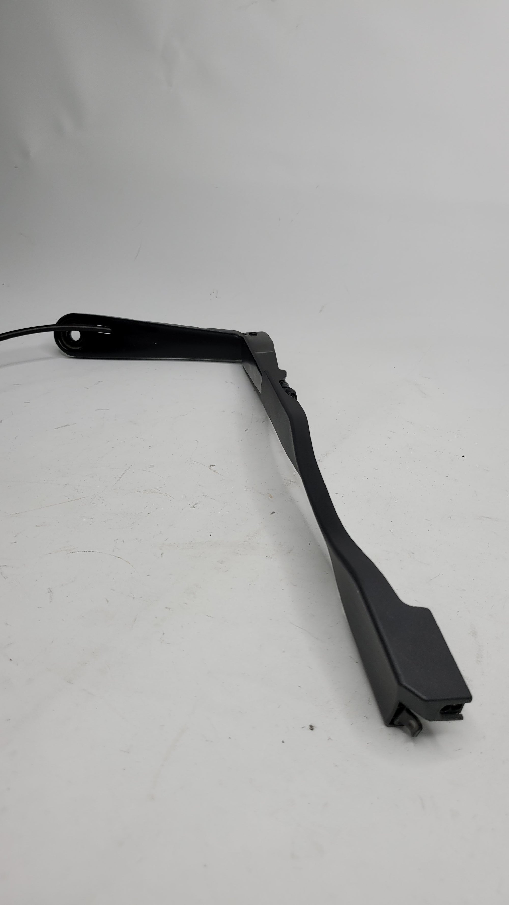 BMW G80 driver side right wiper arm for windshield, MPerformance.parts, showing the black metal wiper arm with mounting hardware.