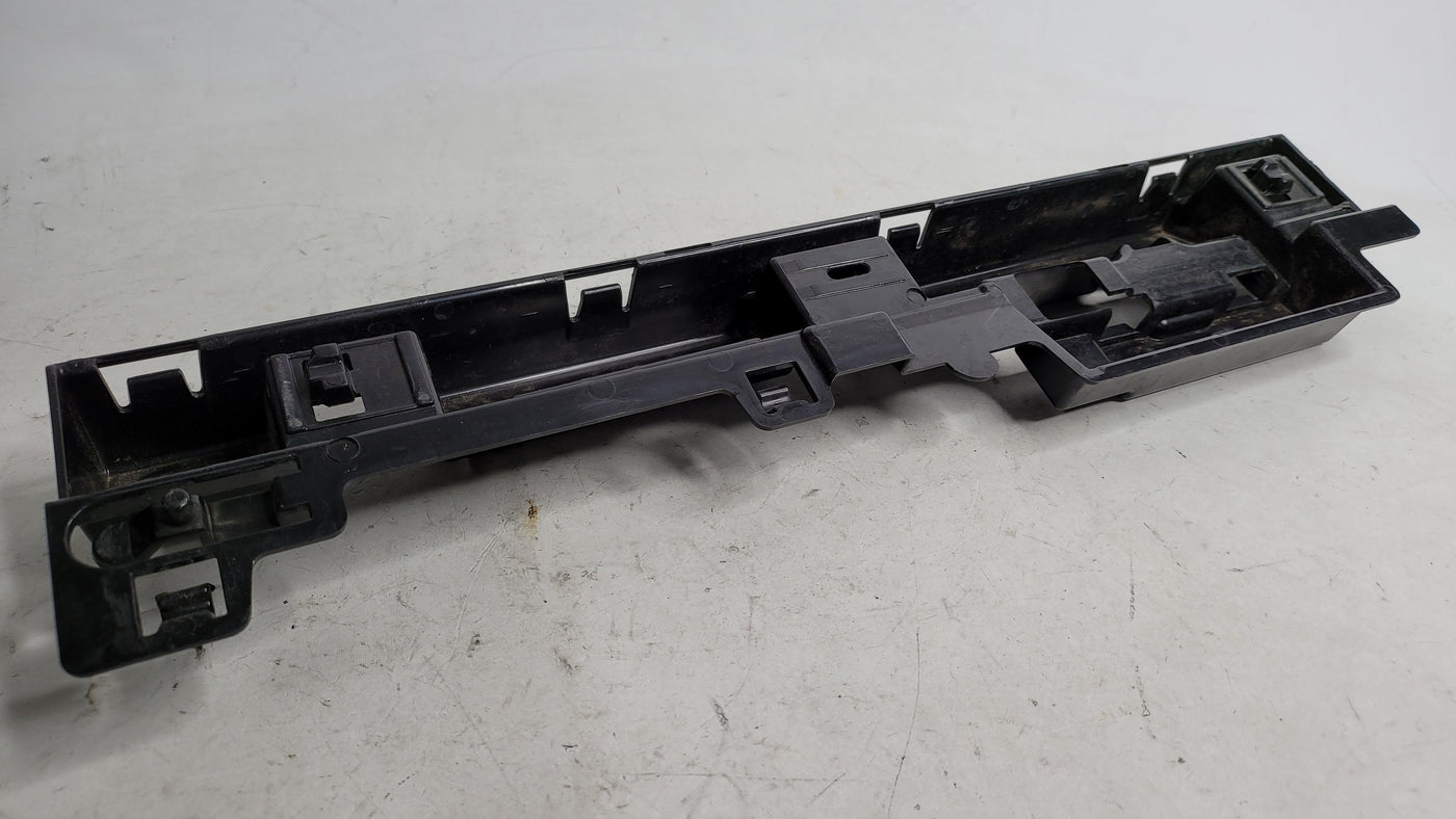 BMW 320i F30 right skirt rocker panel center support bracket by MPerformance.parts, showing the metal mounting component.