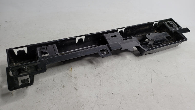 BMW 320i F30 right skirt rocker panel center support bracket by MPerformance.parts, showing the metal mounting component.