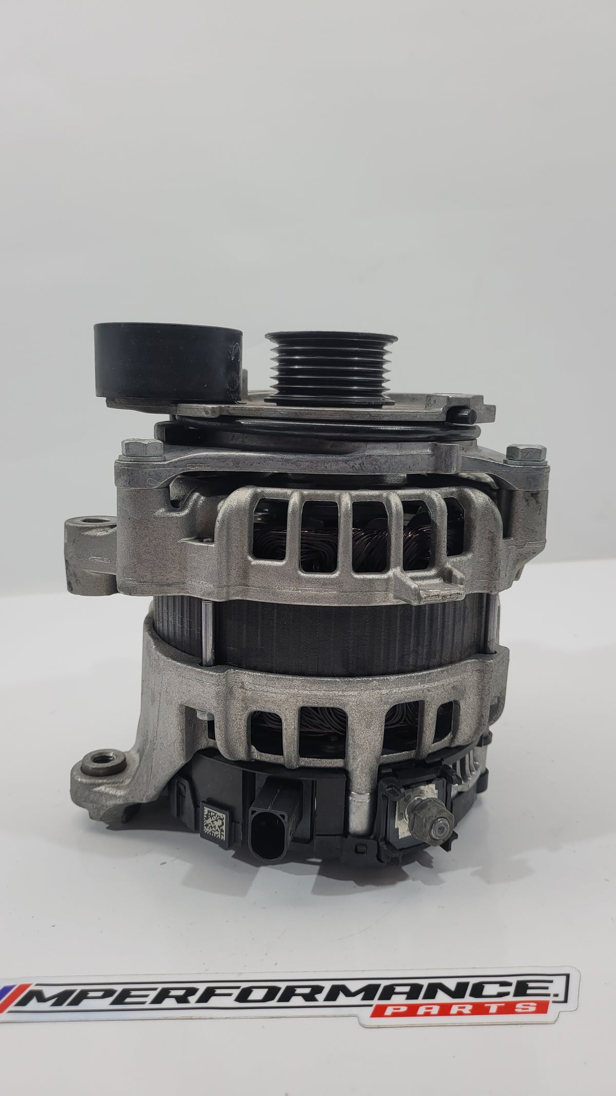 BMW G80 alternator BOSCH 8571358, visible automotive replacement part with pulley and mounting brackets