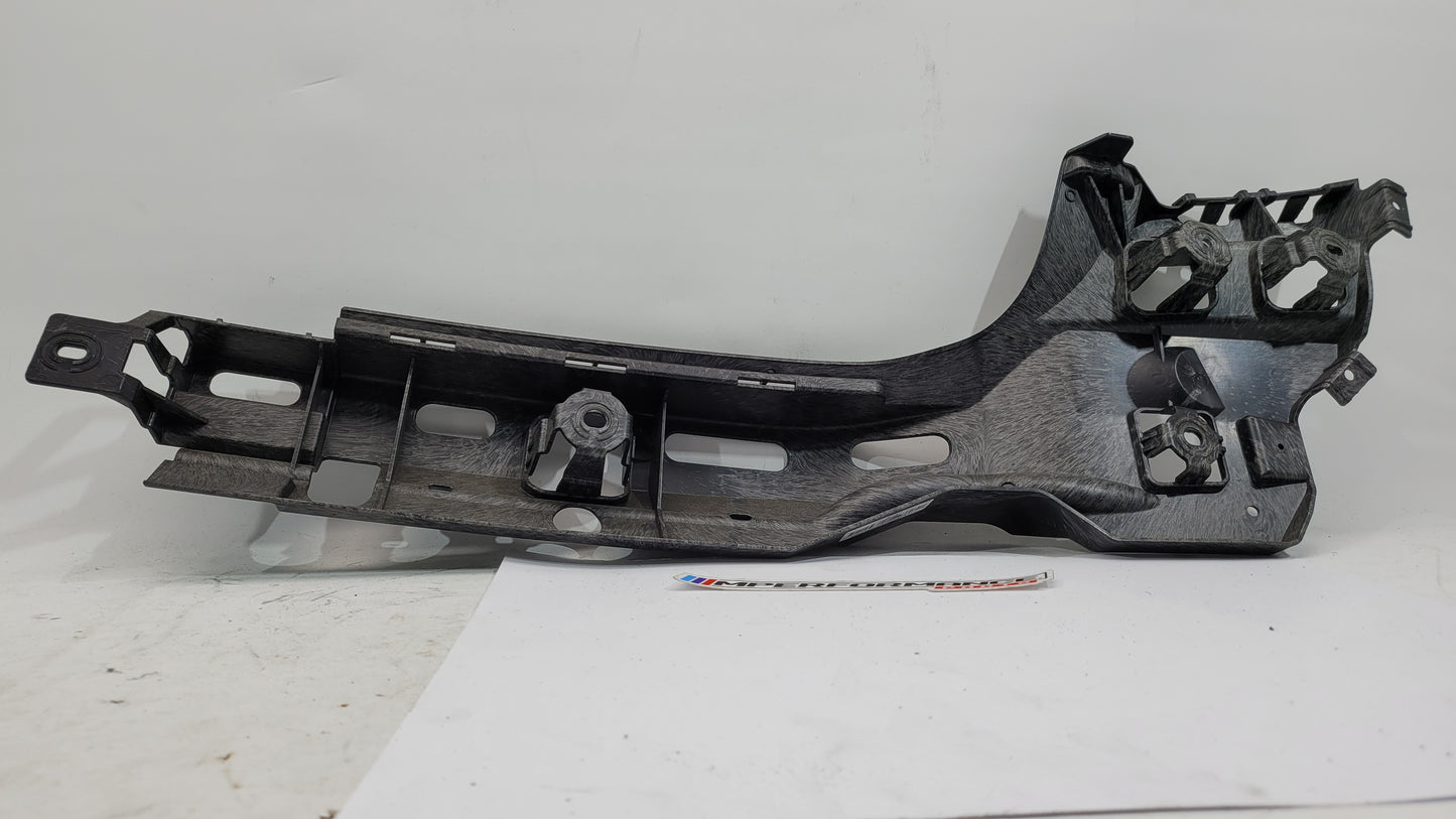 BMW M3 G80 rear left passenger side bumper bracket mount, part 8074697, showing the mounting bracket for the bumper assembly.