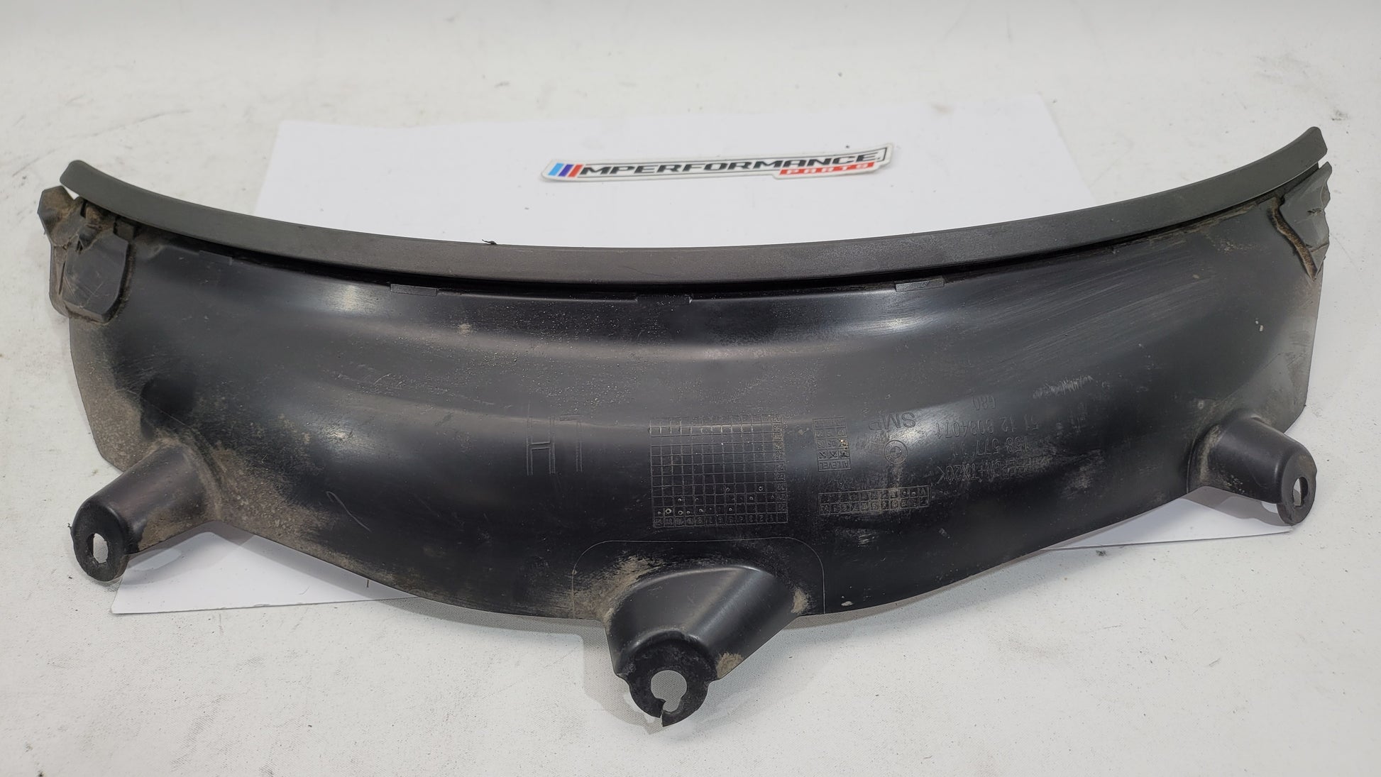 BMW M3 G80 G81 rear left driver side wheel arch trim flaring from MPerformance.parts, showing the textured black wheel arch extension.