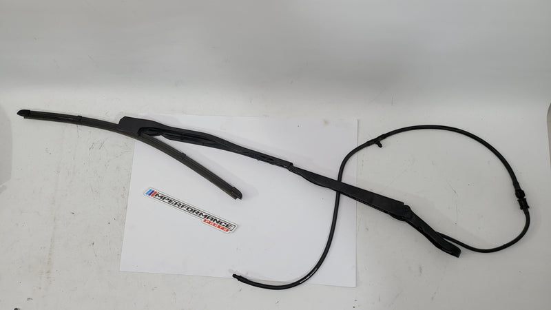 BMW M3 G80 passenger side front wiper arm by MPerformance.parts, showing the metal wiper arm with mounting connector.