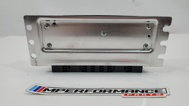 BMW M3 M4 G80 G82 suspension control module VDP 8867451, MPerformance.parts, close-up view of the electronic automotive part.