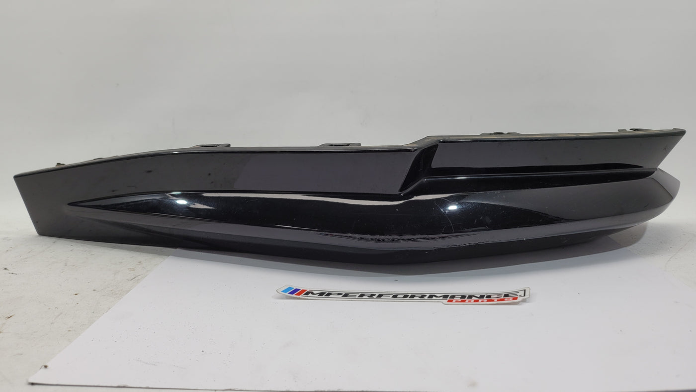 BMW G80 M3 rear bumper left corner spat splitter in black, designed for sporty aerodynamic enhancement.