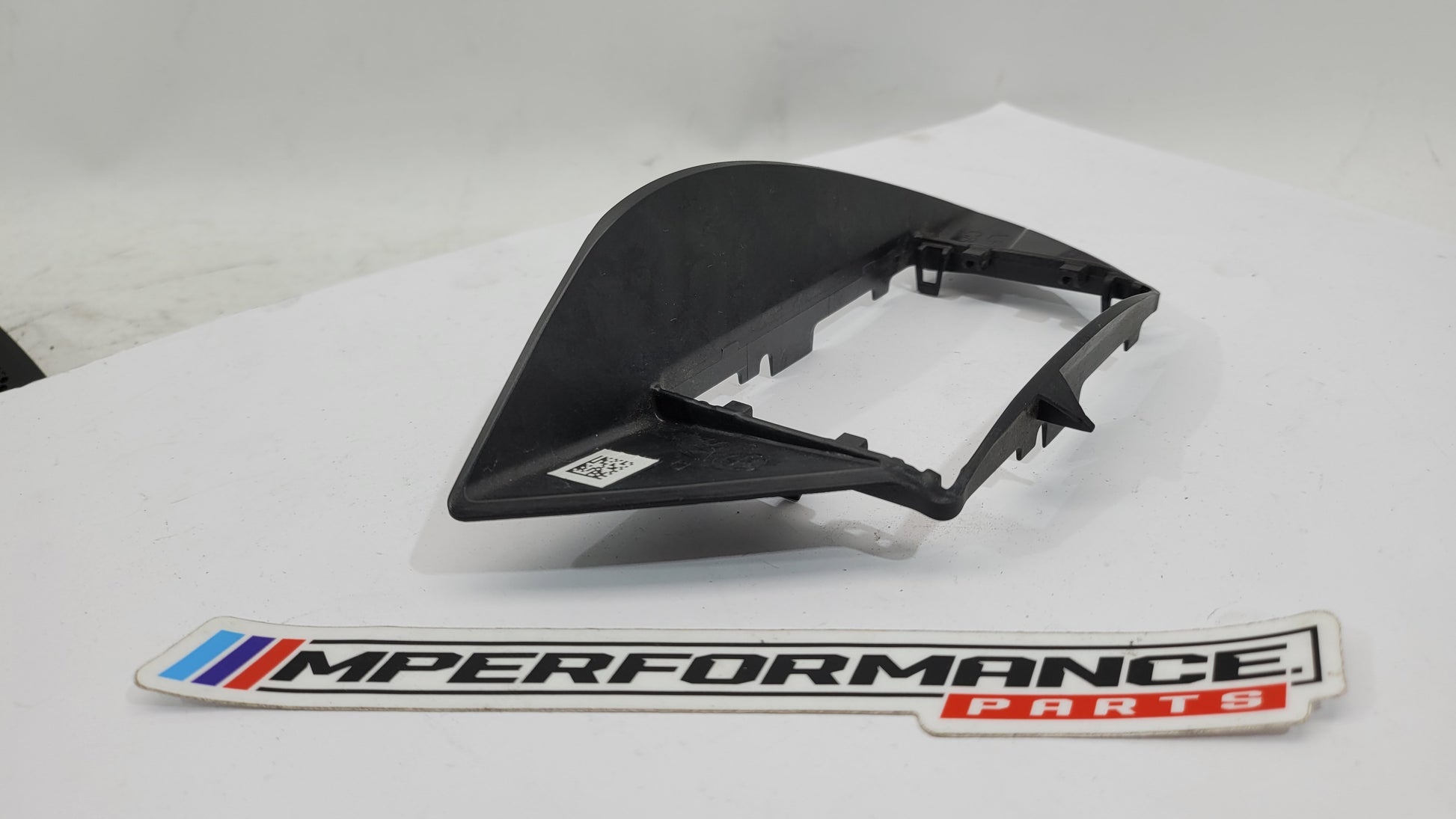 BMW G80 M3 Competition blind spot sensor bracket by MPerformance.parts, showing the black metal mounting bracket for the vehicle.