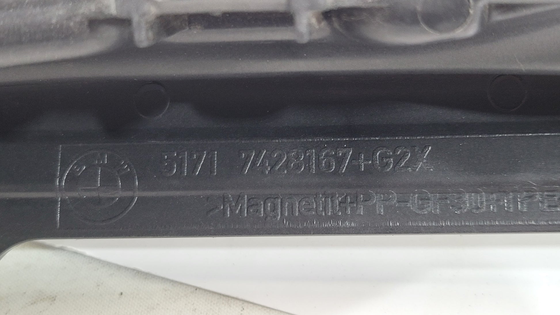 BMW M3 G8x engine compartment panel by MPerformance.parts, showing the black panel installed in the engine bay.