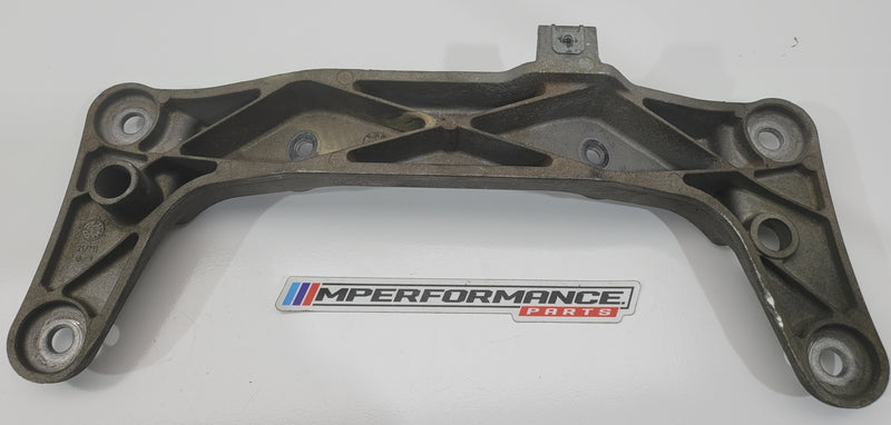 BMW E8X E9X automatic transmission support brace from MPerformance.parts, showing the sturdy metal component with mounting points.
