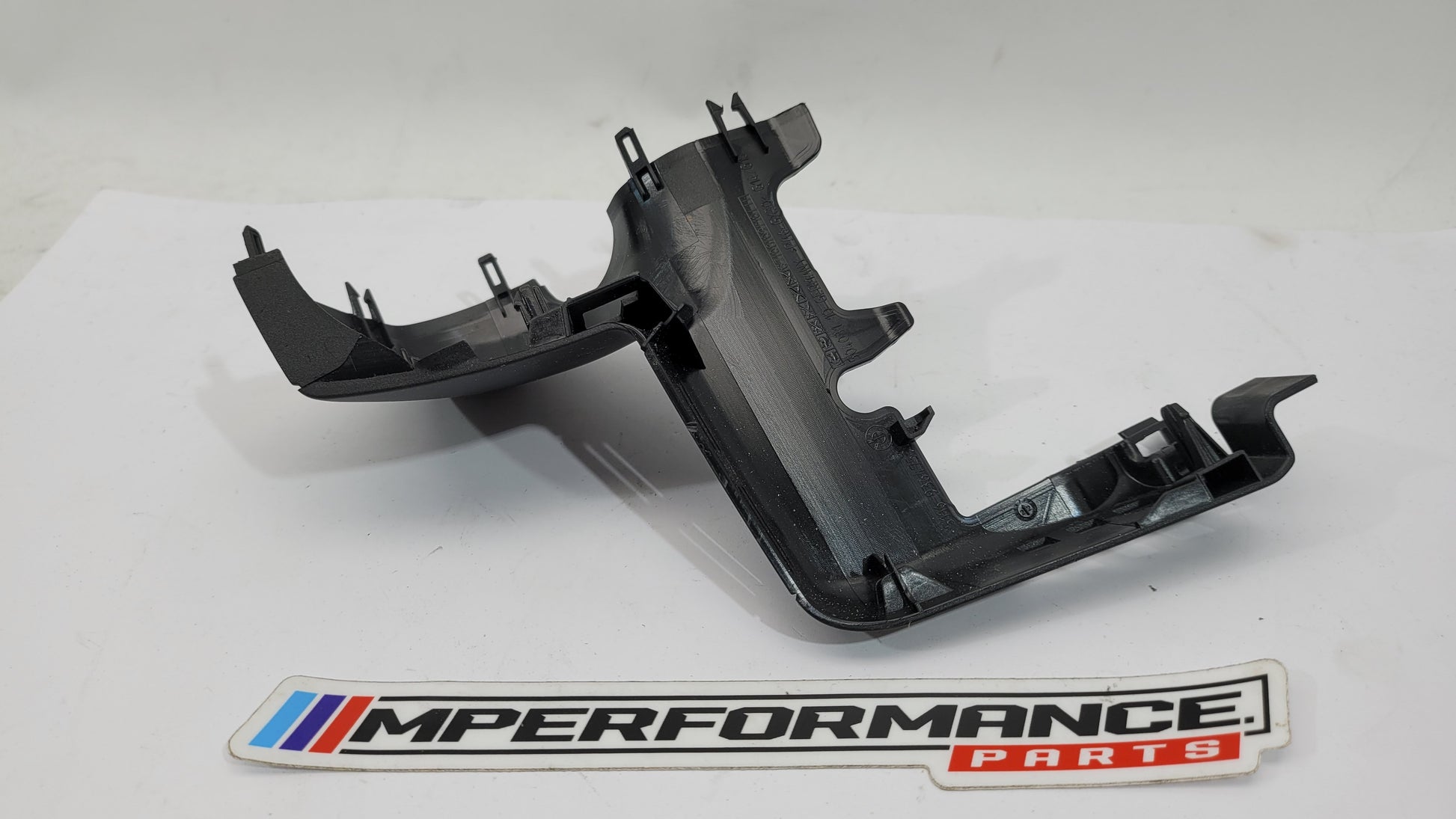 BMW G80 M3 mirror trim in glossy black with chrome accents, designed for a sleek, modern look on the vehicle.