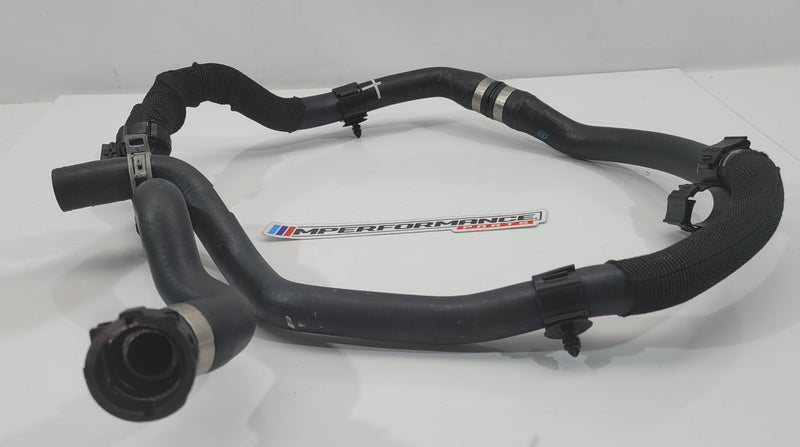 BMW M2 M3 M4 G87 G80 G81 G82 G83 heater water coolant pipe hose line by MPerformance.parts, showing the flexible hose and connectors.