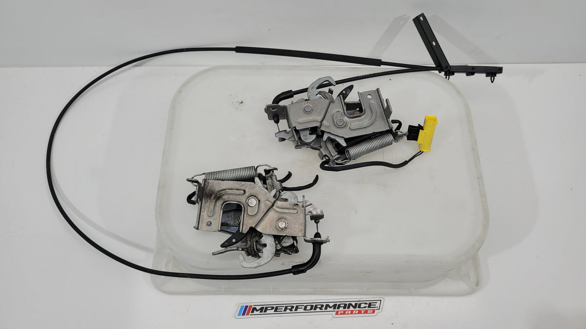 G80 G82 hood latch set 7468349 7468350 by MPerformance.parts, showing two metal latch assemblies