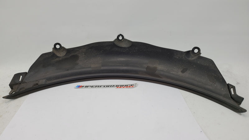 BMW M3 G80 G81 rear left driver side wheel arch trim flaring, MPerformance.parts, close-up of the black plastic wheel arch extension.