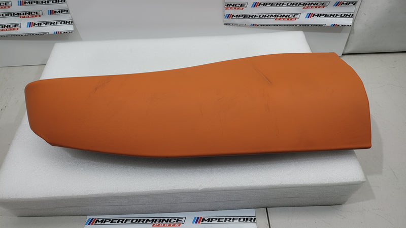 G80 M3 Kyalami Orange right rear seat bolster by MPerformance.parts, showing detailed orange leather upholstery and seat contour.