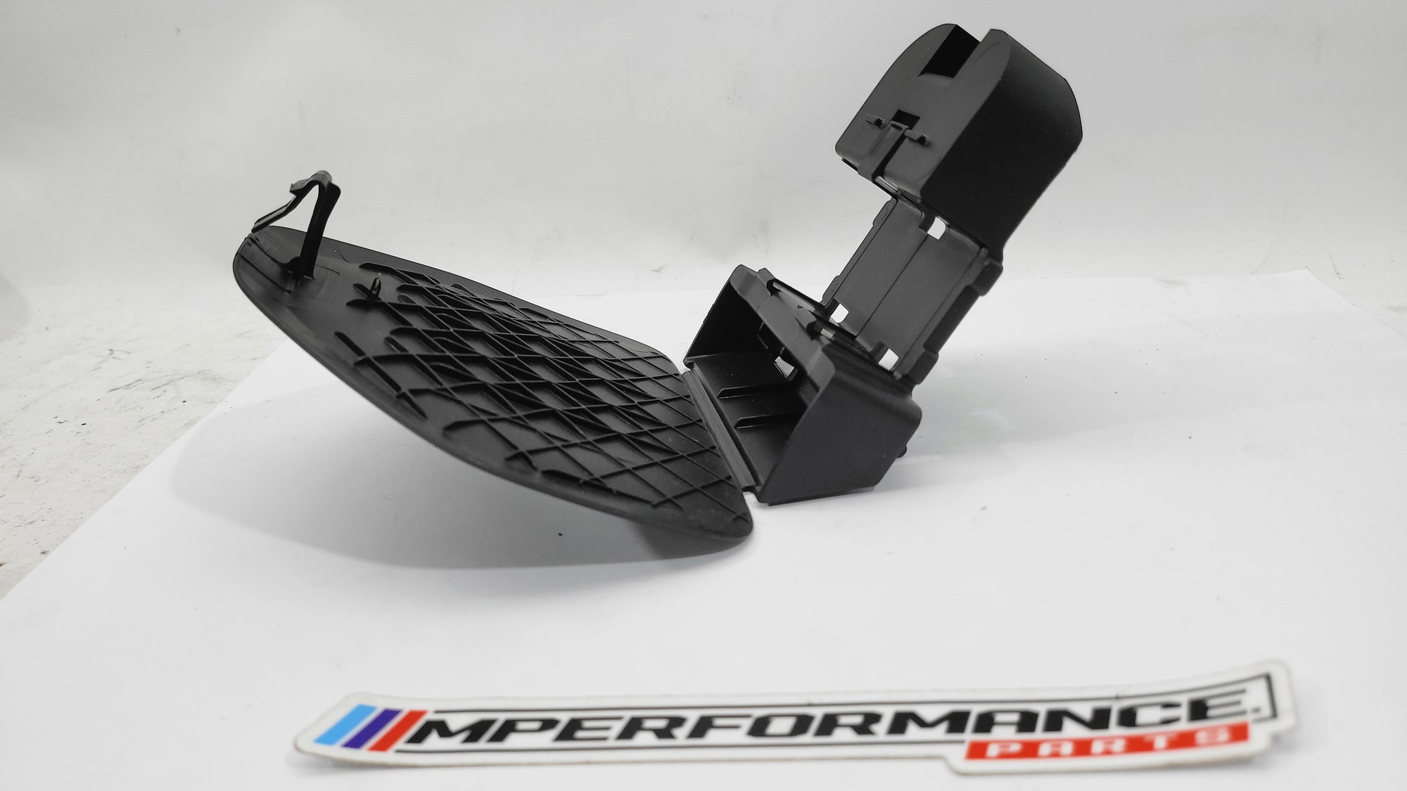 BMW G20 G30 F90 G11 G12 warning triangle carrier bracket, MPerformance.parts, showing the sturdy metal mounting component.
