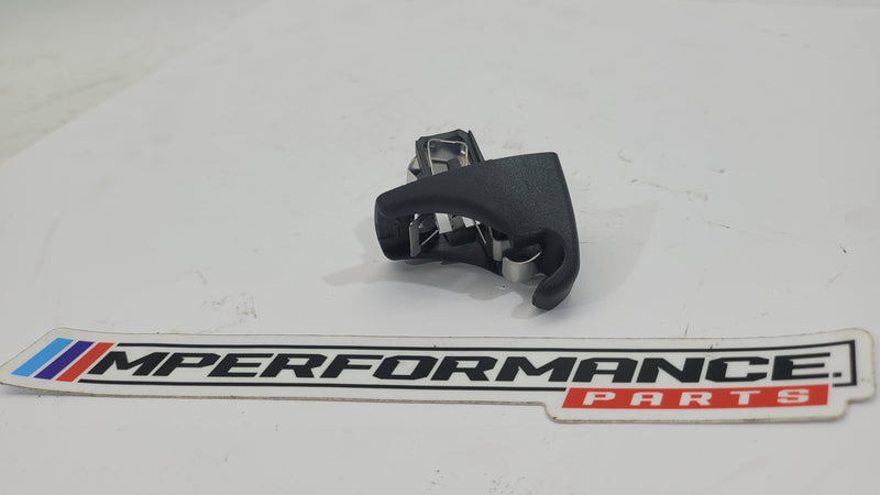BMW M3 G8x sun visor clip hook bracket by MPerformance.parts, showing the metal bracket for securing sun visors in the vehicle.