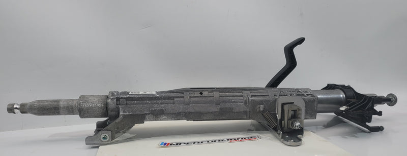 BMW G80 G81 M3, G82 G83 M4, G87 M2 MPerformance.parts steering column, showing the sleek, black automotive component.