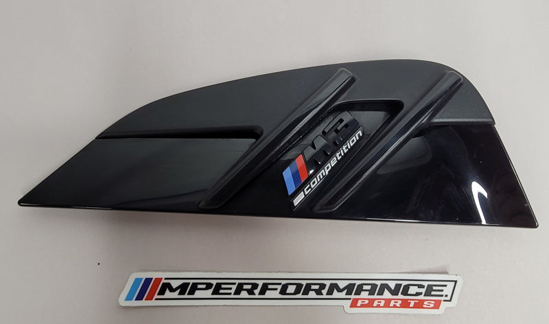 BMW M3 Competition G80 badge with chrome finish and black background, featuring "177057-10" model number engraving.