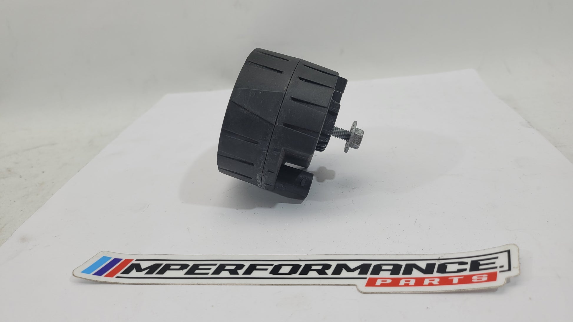 BMW M2 F87 sensor alarm horn siren control module unit, MPerformance.parts replacement part, showing the compact electronic module.