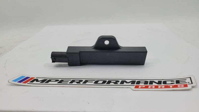 BMW M3 F80 interior keyless access antenna module, showing the small electronic component with connectors and circuit board details.