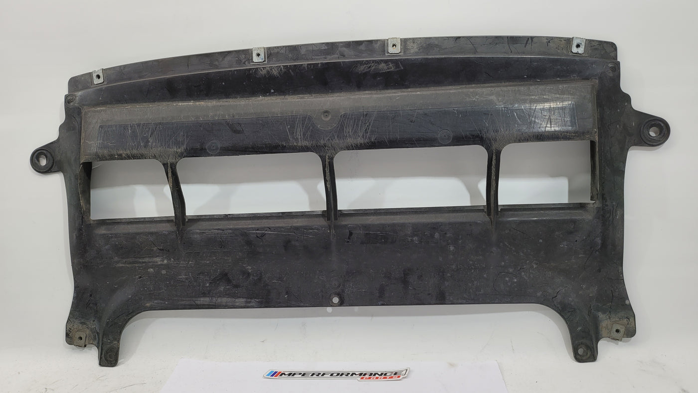 BMW M3 F80 front centre bumper belly pan by MPerformance.parts, showing the black plastic underside component with mounting points.