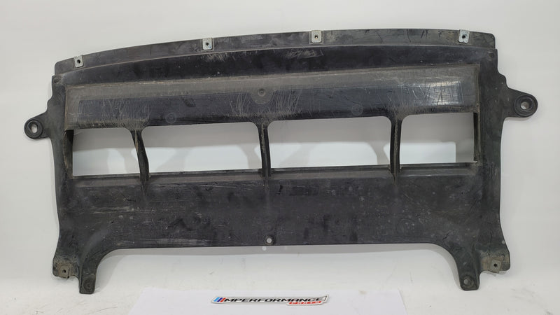 BMW M3 F80 front centre bumper belly pan by MPerformance.parts, showing the black plastic underside component with mounting points.
