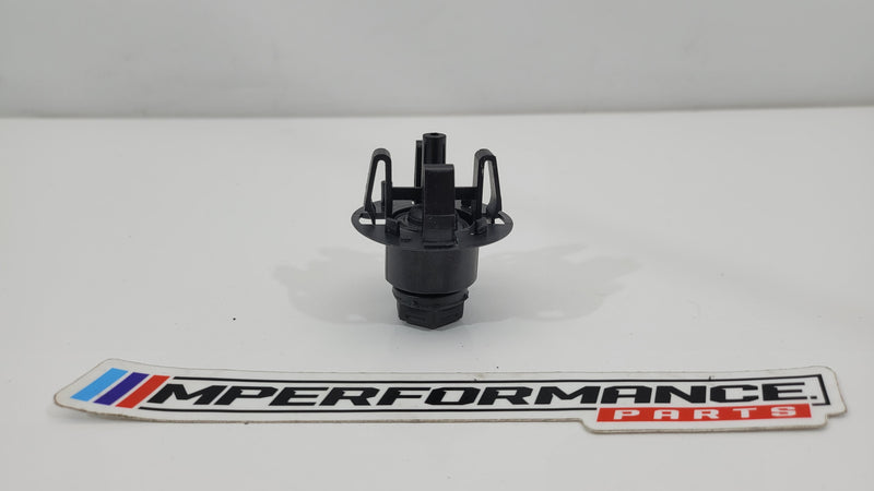 BMW hood bumper cushion stopper adjuster, part number 7348121, showing the black rubber bumper with mounting features.