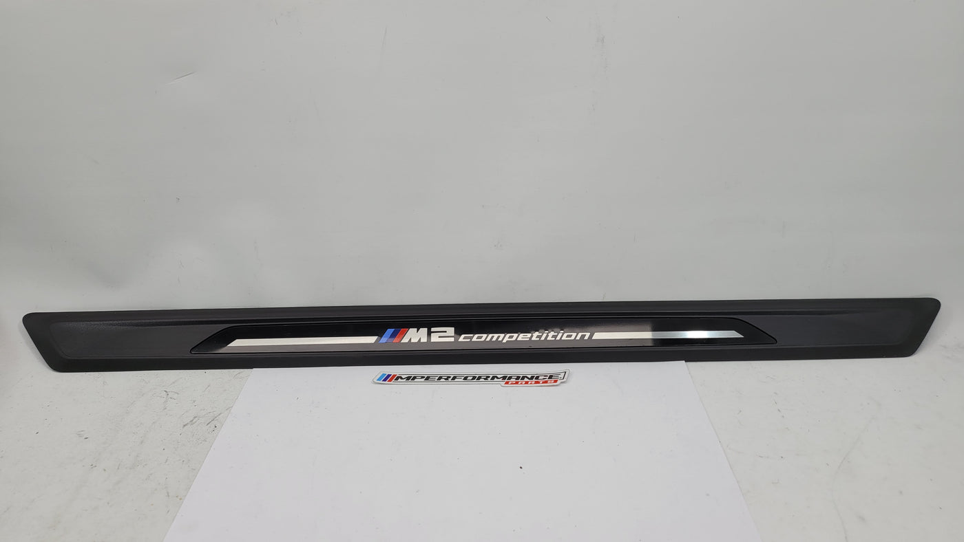BMW M2 Competition F87 door sill scuff plate, left or right side, MPerformance.parts, close-up of the black protective trim.
