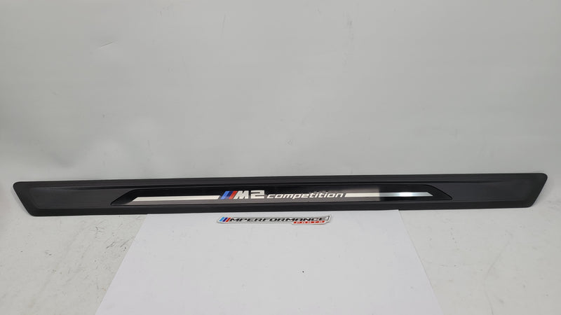 BMW M2 Competition F87 door sill scuff plate, left or right side, MPerformance.parts, close-up of the black protective trim.
