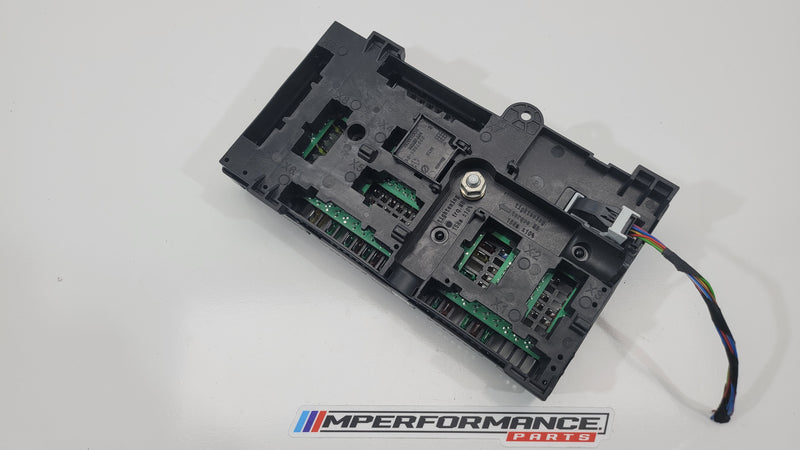BMW M3 G80 and M4 G82 fuse box from MPerformance.parts, showing the electrical component and connection points.
