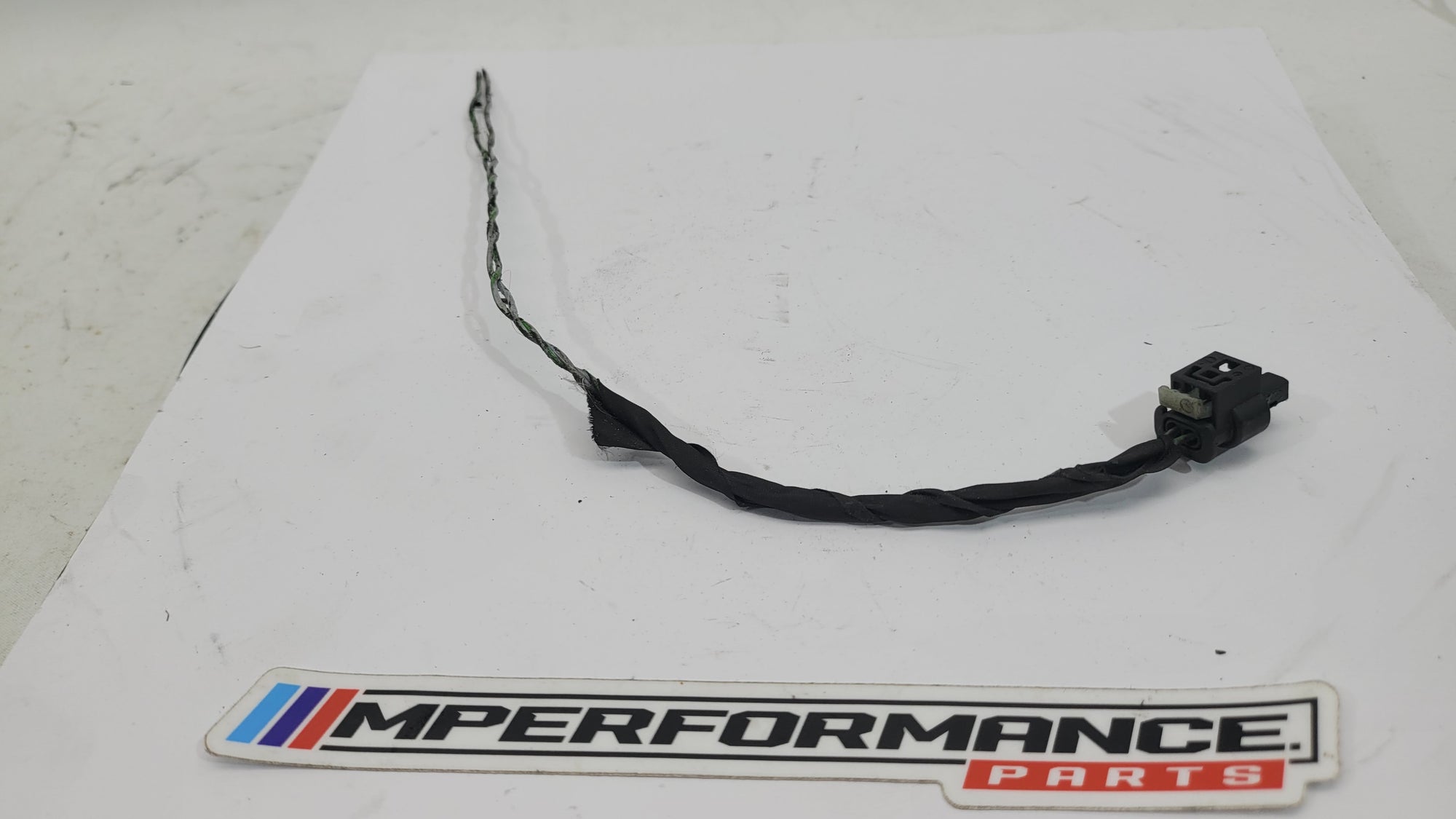 BMW fuel injector wiring harness connector pigtail plug socket, MPerformance.parts, close-up view of the electrical connector.
