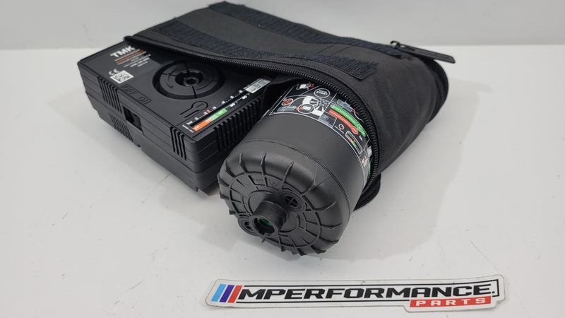 BMW Tire Repair Kit with sealant, compressor, and tools from MPerformance.parts, featuring compact mobility set for quick tire fixes.