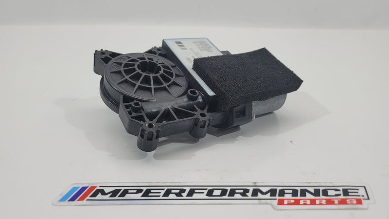 BMW M4 G82 left front door window glass motor by MPerformance.parts, showing the compact electrical component with wiring.